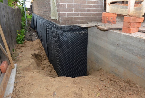 SJ Waterproofing Pros technician performing targeted Foundation Crack Repair assessment in Warsaw, OH
